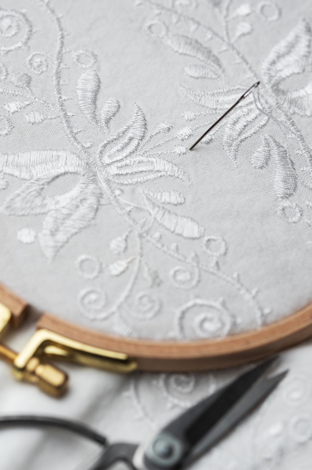 Floral embroidered handkerchief with metallic accents